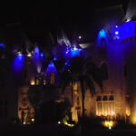 Image of the castle at nighttime that is a beautiful site with a touch of romance.